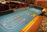 <i>Celebrity Infinity</i>.<br>La table de Craps du casino <i>Fortunes</i>.