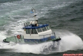 Canal de Beagle, Terre de Feu, Patagonie.<br>Arrivée du bateau du pilote chilien, qui s'apprête à monter à bord du <i>Celebrity Infinity</i>.