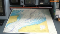 [no_rights] Cargo porte-conteneurs <i>Samskip Express</i>.<br>Pour franchir le Pas de Calais, rien de tel qu'une bonne vieille carte en papier.<br>Les zones violettes sont interdites à la navigation: on distingue bien les rails montant et descendant.