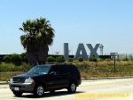 <i>LAX</i> = aéroport international de Los Angeles.